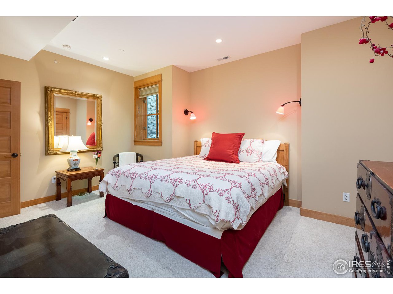 520 Spruce Street Boulder, CO 80302 - Photo 27 of 40 a bedroom with a bed a table and chair