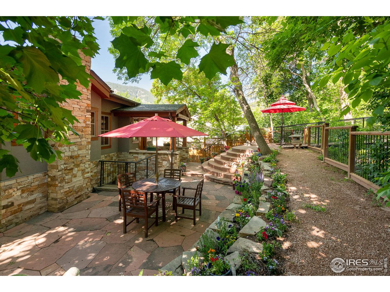 520 Spruce Street Boulder, CO 80302 - Photo 5 of 40 a patio with table and chairs