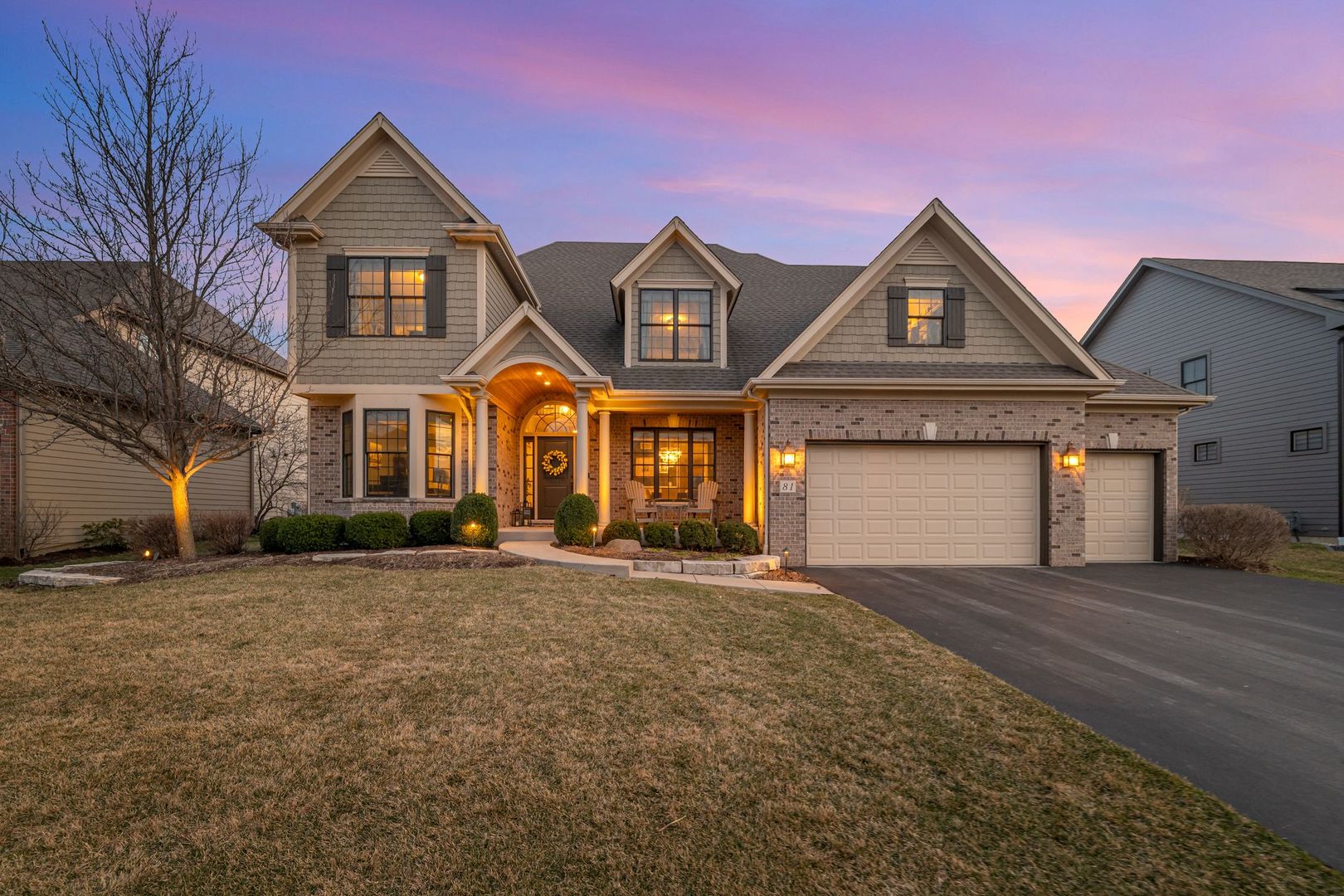 a front view of a house with a yard