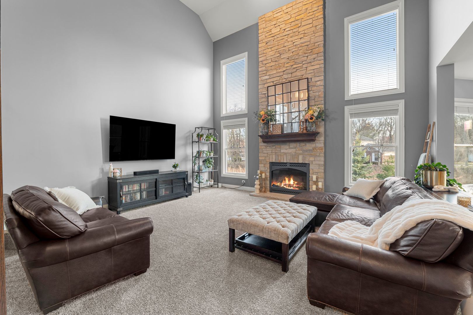 81 Landon Circle Wheaton, IL 60189 - Photo 13 of 79 a living room with furniture and a flat screen tv