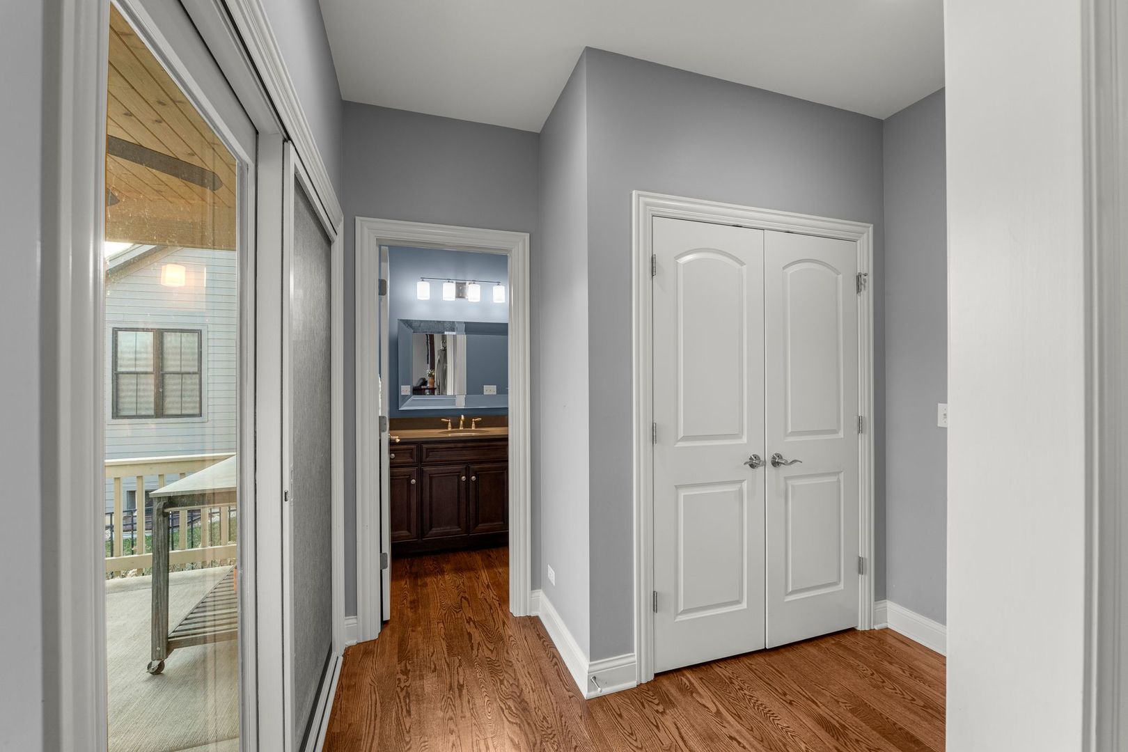 81 Landon Circle Wheaton, IL 60189 - Photo 25 of 79 a view of a hallway with wooden floor and closet area
