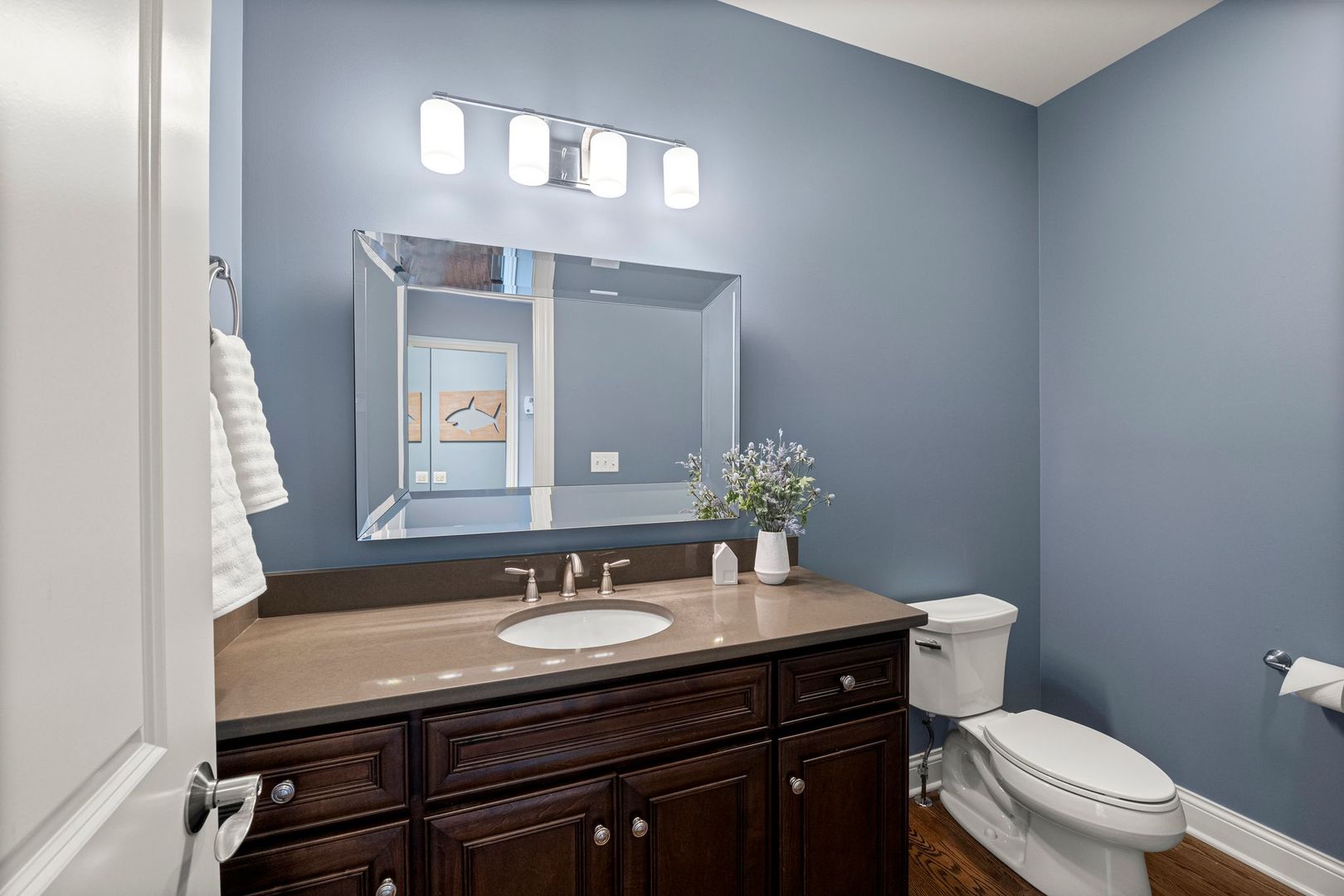 81 Landon Circle Wheaton, IL 60189 - Photo 26 of 79 a bathroom with a granite countertop sink a toilet and a mirror
