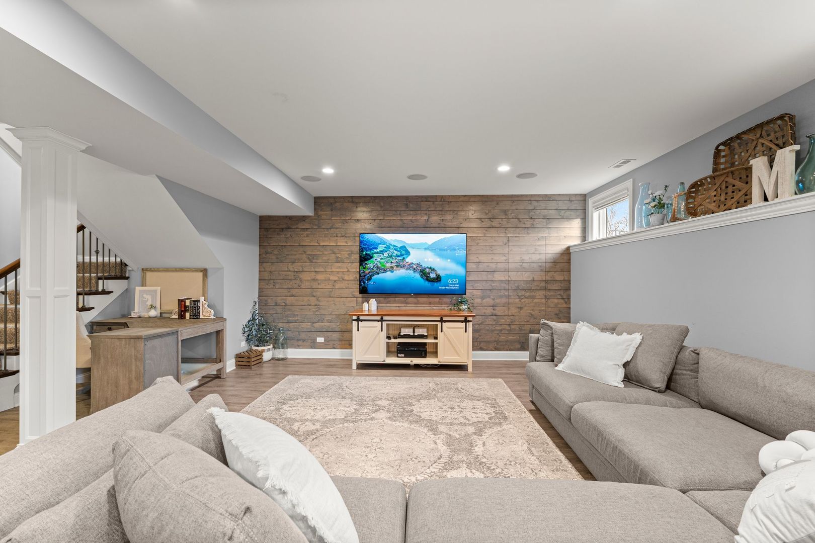 81 Landon Circle Wheaton, IL 60189 - Photo 48 of 79 a living room with furniture and a flat screen tv