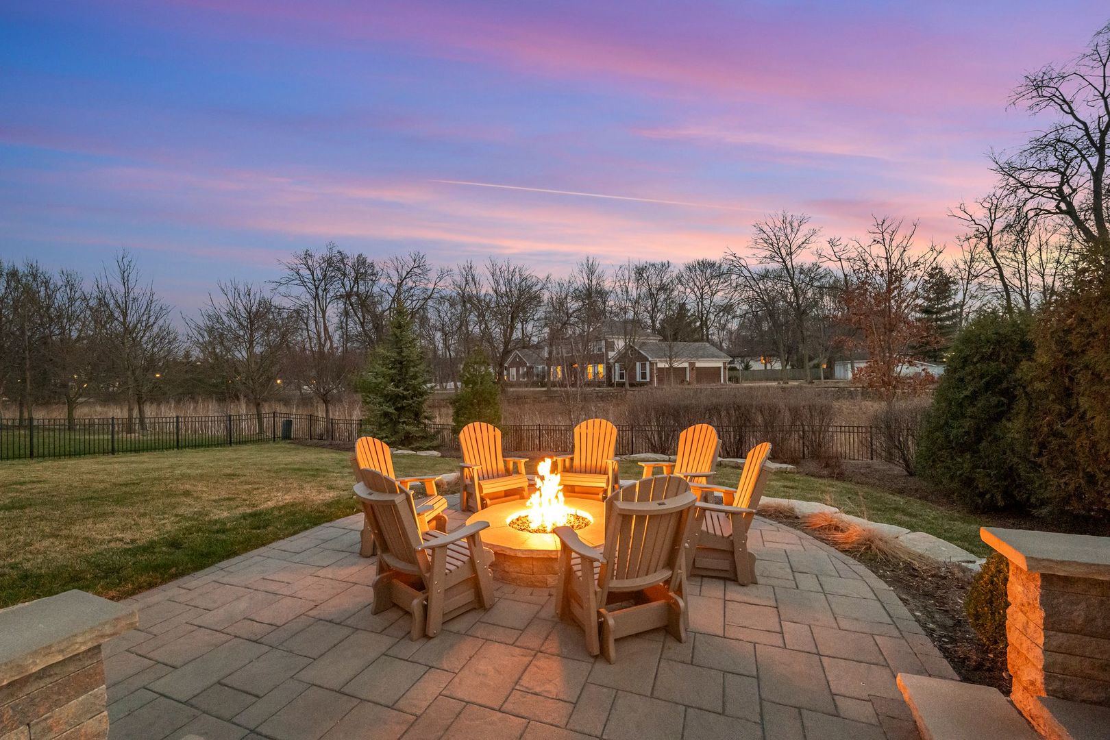 81 Landon Circle Wheaton, IL 60189 - Photo 71 of 79 a backyard of a house with table and chairs