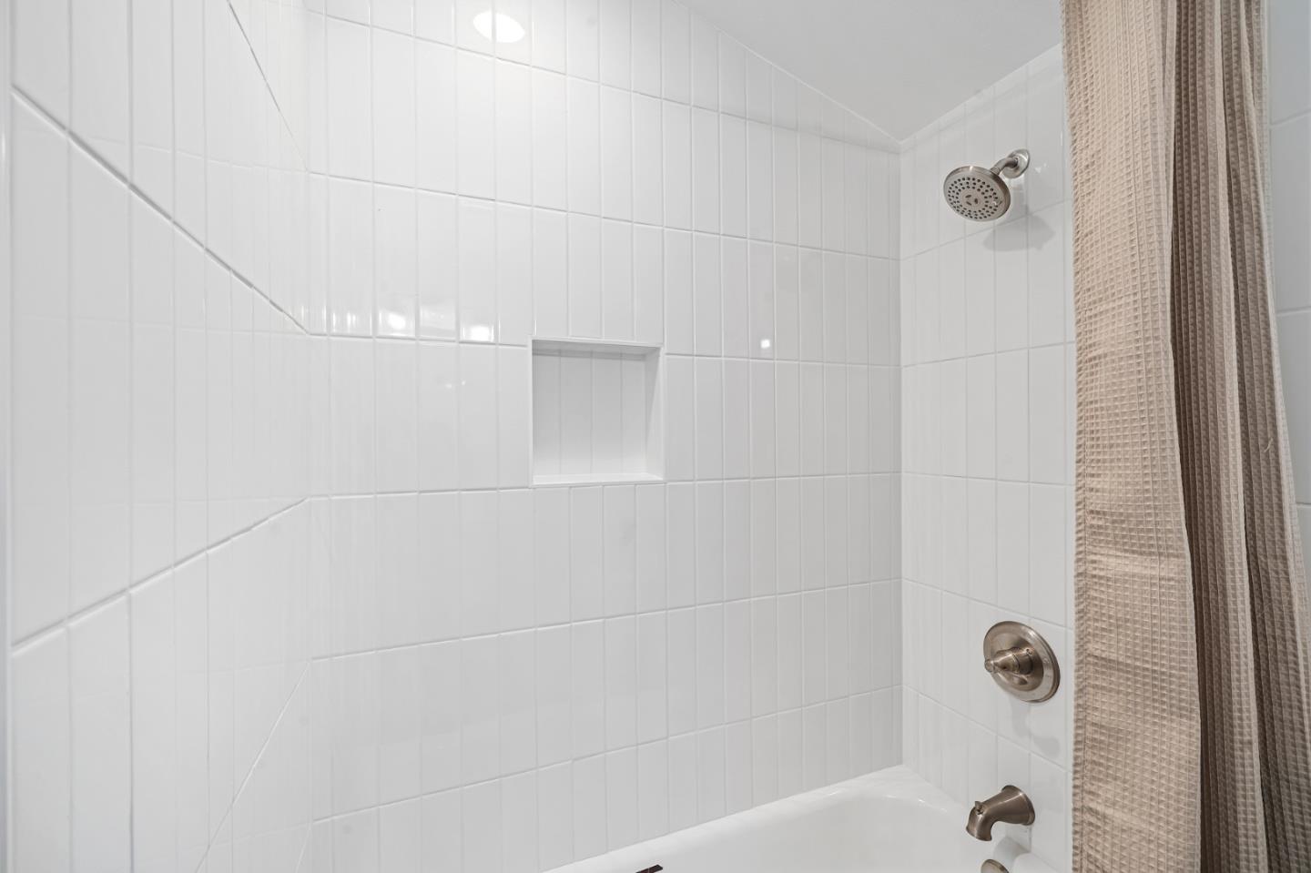 827 Bend Avenue San Jose, CA 95136 - Photo 14 of 27 a bathroom with a shower