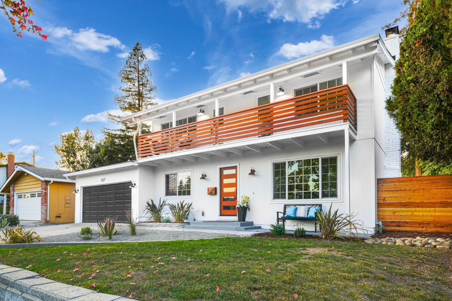 827 Bend Avenue San Jose, CA 95136 - Photo 2 of 27 a front view of a house with a yard and garage