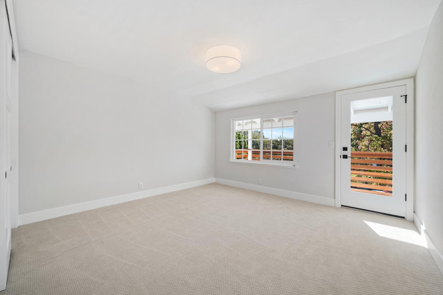 827 Bend Avenue San Jose, CA 95136 - Photo 22 of 27 an empty room with windows