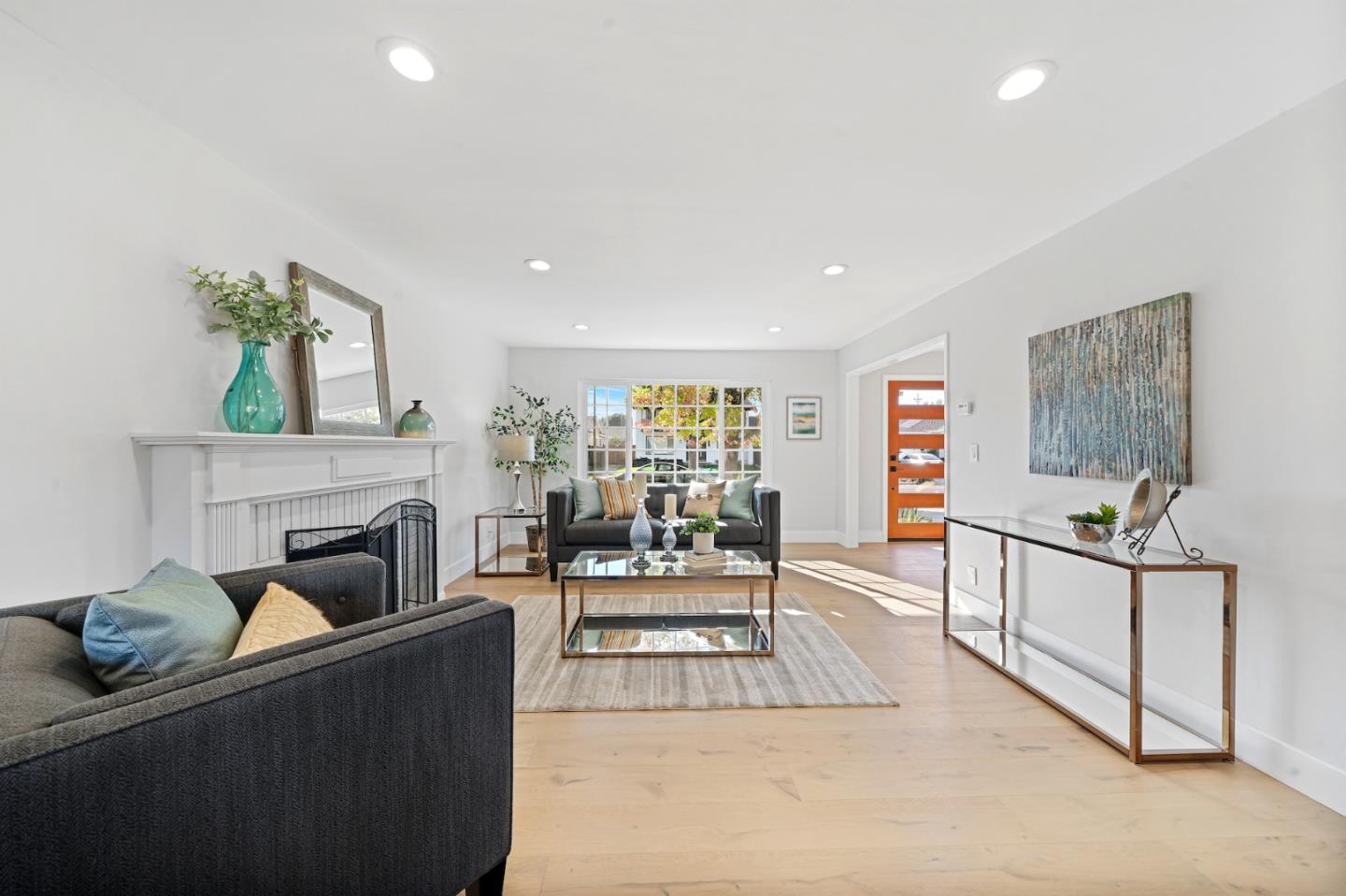 827 Bend Avenue San Jose, CA 95136 - Photo 5 of 27 a living room with furniture and a fireplace