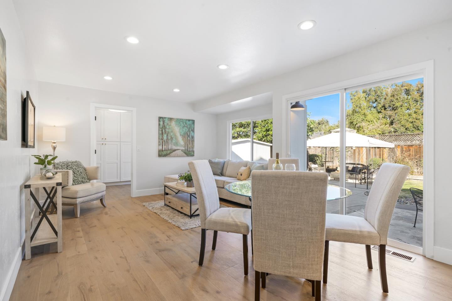 827 Bend Avenue San Jose, CA 95136 - Photo 9 of 27 a dining room with furniture and wooden floor