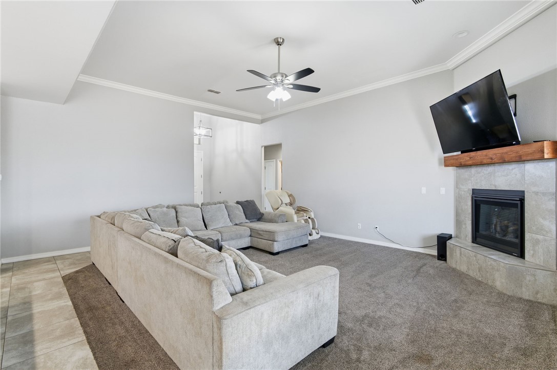 4713 North Old Ranch Lane Kingman, AZ 86401 - Photo 33 of 41 a living room with furniture and a fireplace