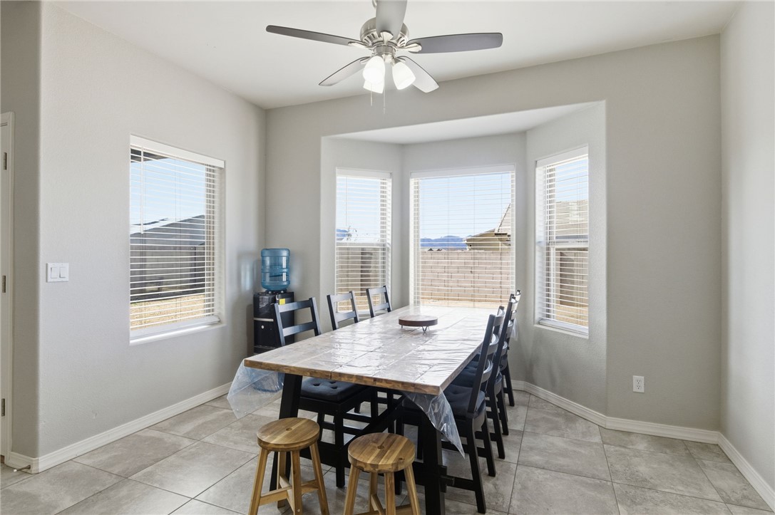 4713 North Old Ranch Lane Kingman, AZ 86401 - Photo 9 of 41 a view of a dining room with furniture window and outside view