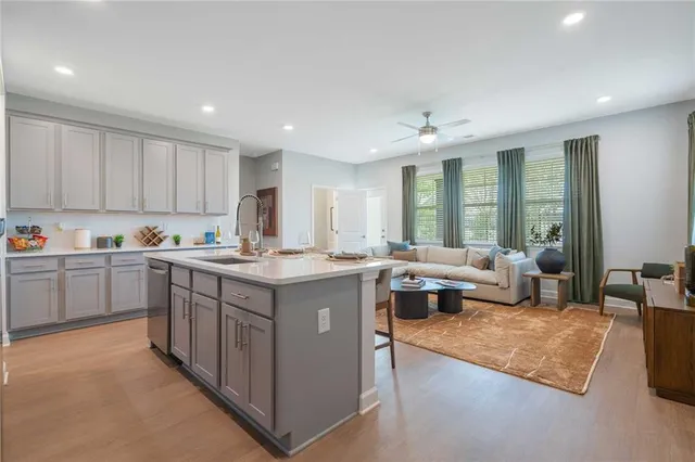 a open kitchen with stainless steel appliances granite countertop a lot of counter space and a sink