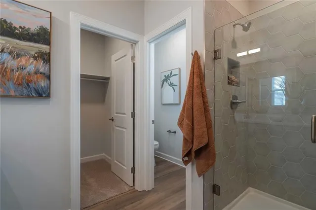 a view of a hallway with washer and dryer