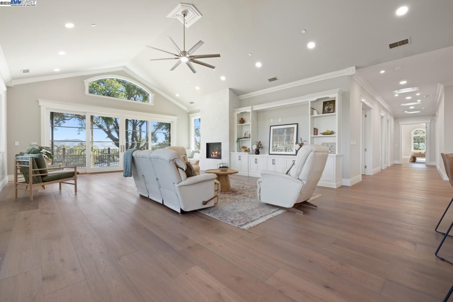 700 Clipper Hill Road Danville, CA 94526 - Photo 13 of 35 a living room with furniture and a wooden floor
