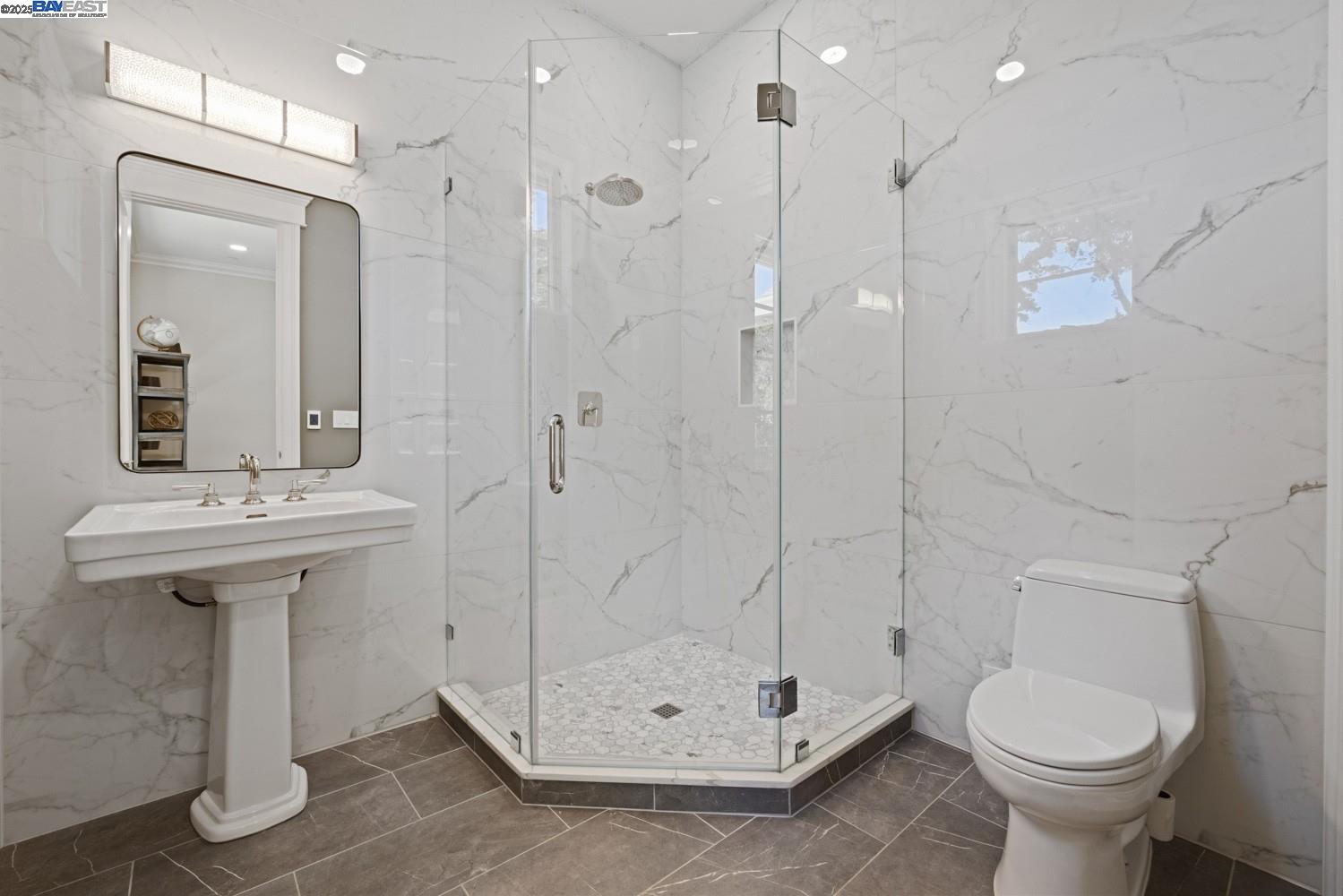 700 Clipper Hill Road Danville, CA 94526 - Photo 20 of 35 a bathroom with a sink a toilet and shower