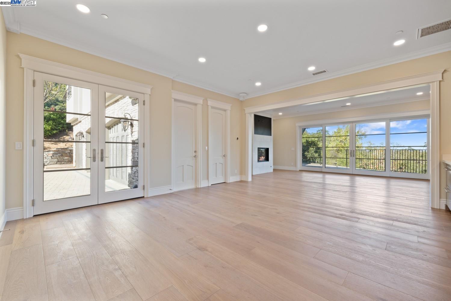 700 Clipper Hill Road Danville, CA 94526 - Photo 22 of 35 a view of an empty room with wooden floor and a window