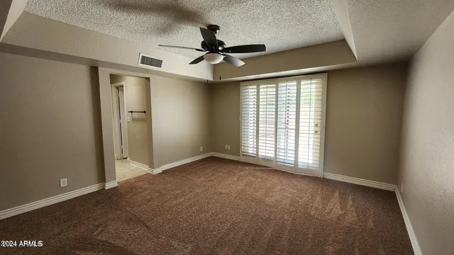 a view of room with racks on the wall