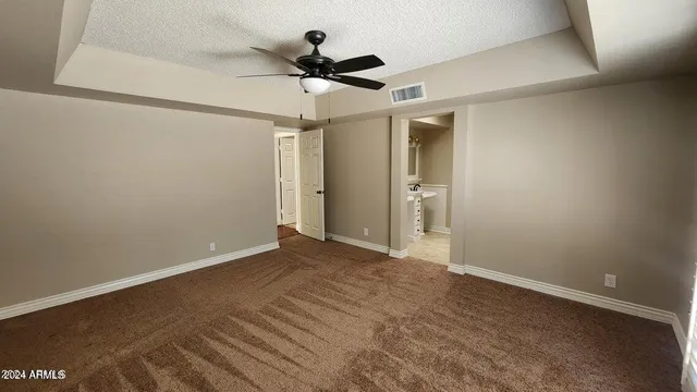 a bathroom with a sink vanity and a mirror