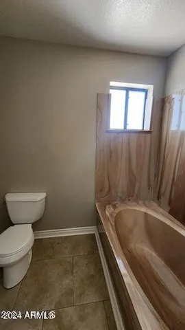 a view of a livingroom with wooden floor