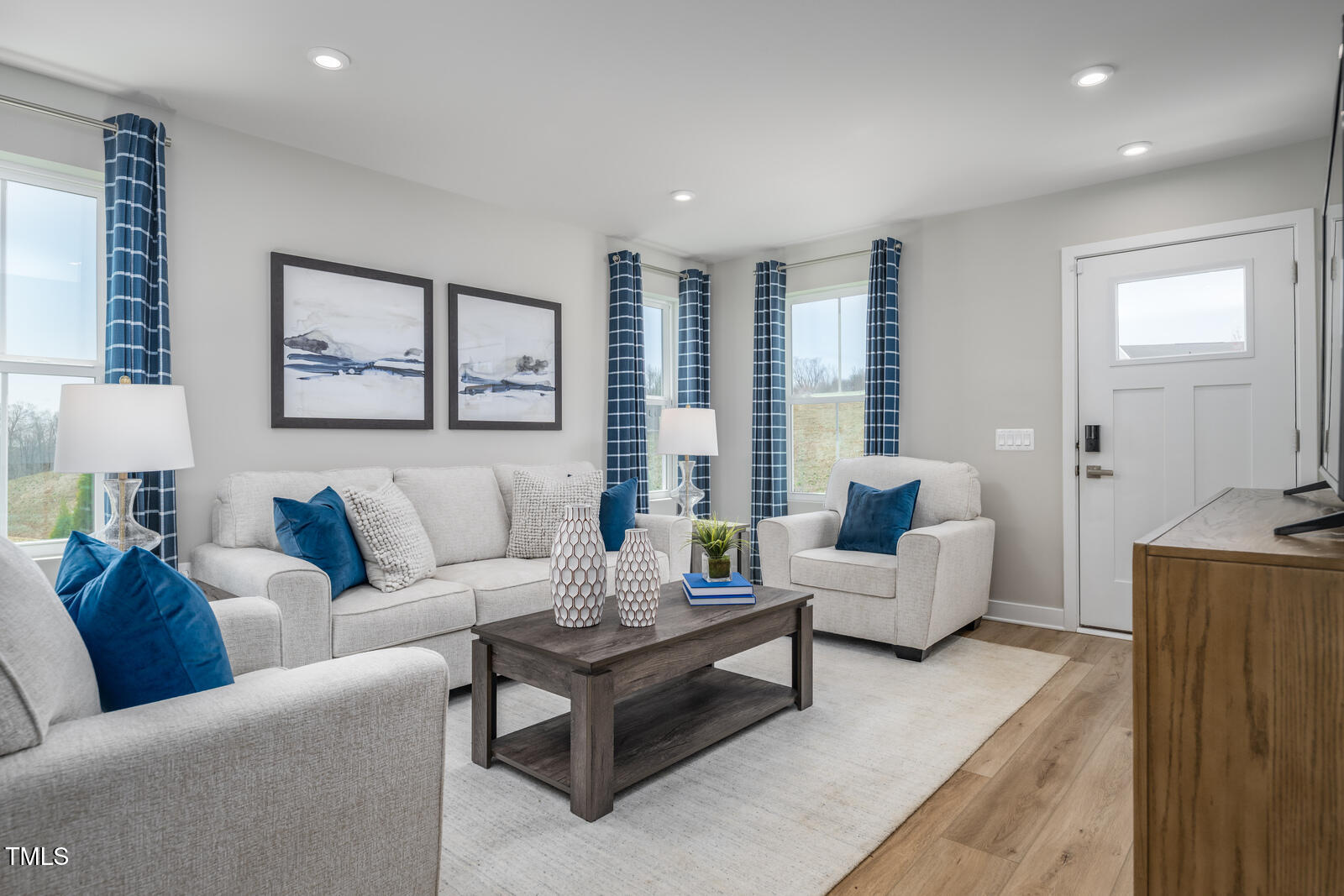 456 Grand Silo Road Raleigh, NC 27603 - Photo 8 of 21 a living room with furniture and a large window