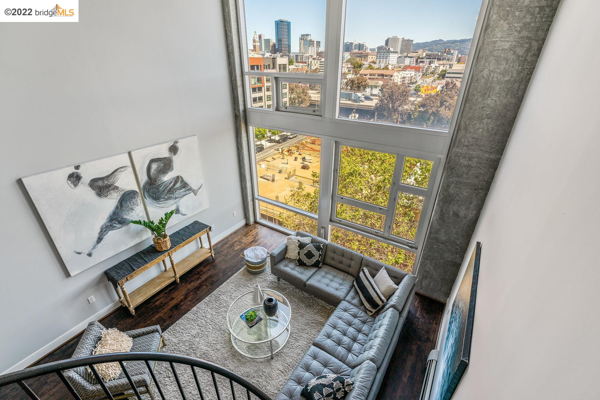 311 Oak Street, Unit PH 7 Oakland, CA 94607 - Photo 1 of 1 wooden floor with outdoor seating