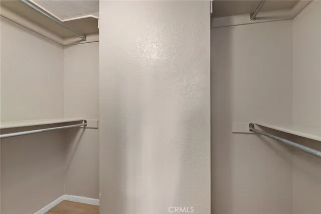 a view of a room with racks on the wall