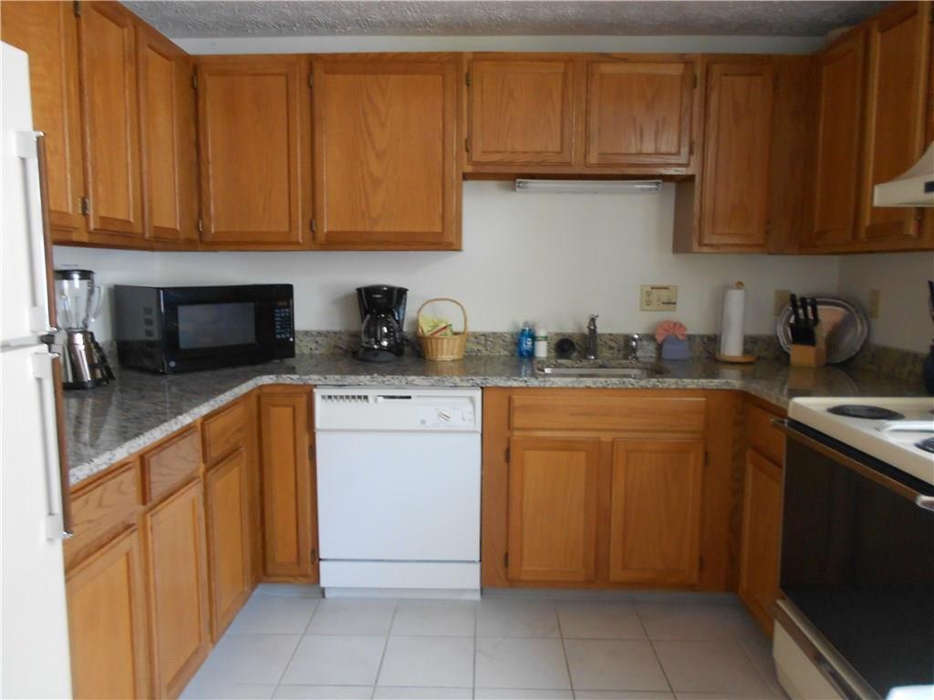 1373 Post Road, Unit 100C Wells, ME 04090 - Photo 6 of 25 Fully applianced kitchen with...