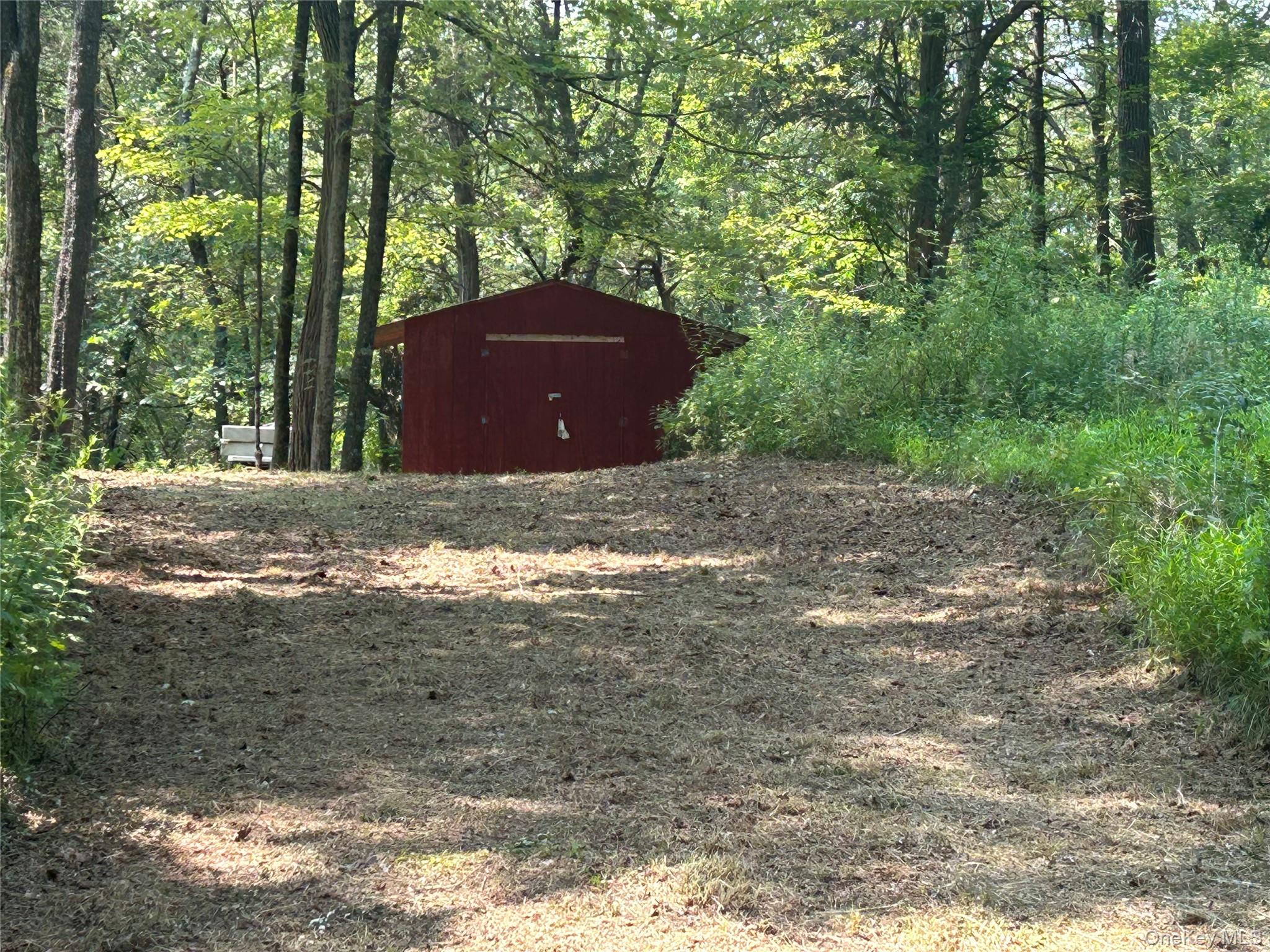White Schoolhouse Road Rhinebeck, NY 12572 - Photo 4 of 13 a view of a yard with large trees