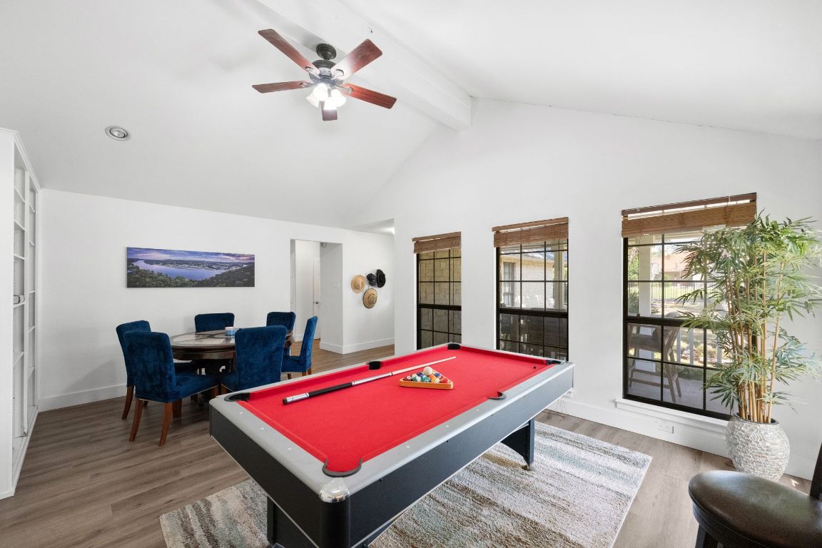 1709 Channel Road Austin, TX 78746 - Photo 20 of 27 a room with pool table and windows