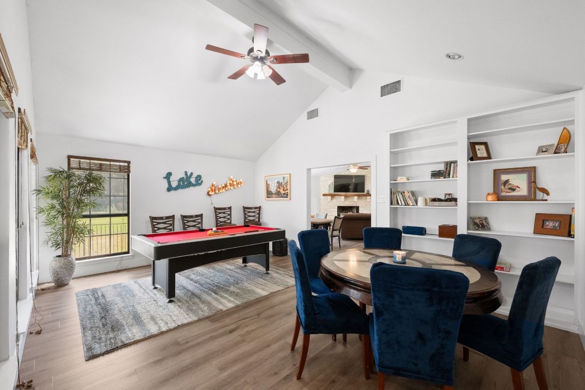 1709 Channel Road Austin, TX 78746 - Photo 5 of 27 a living room with furniture piano and a window