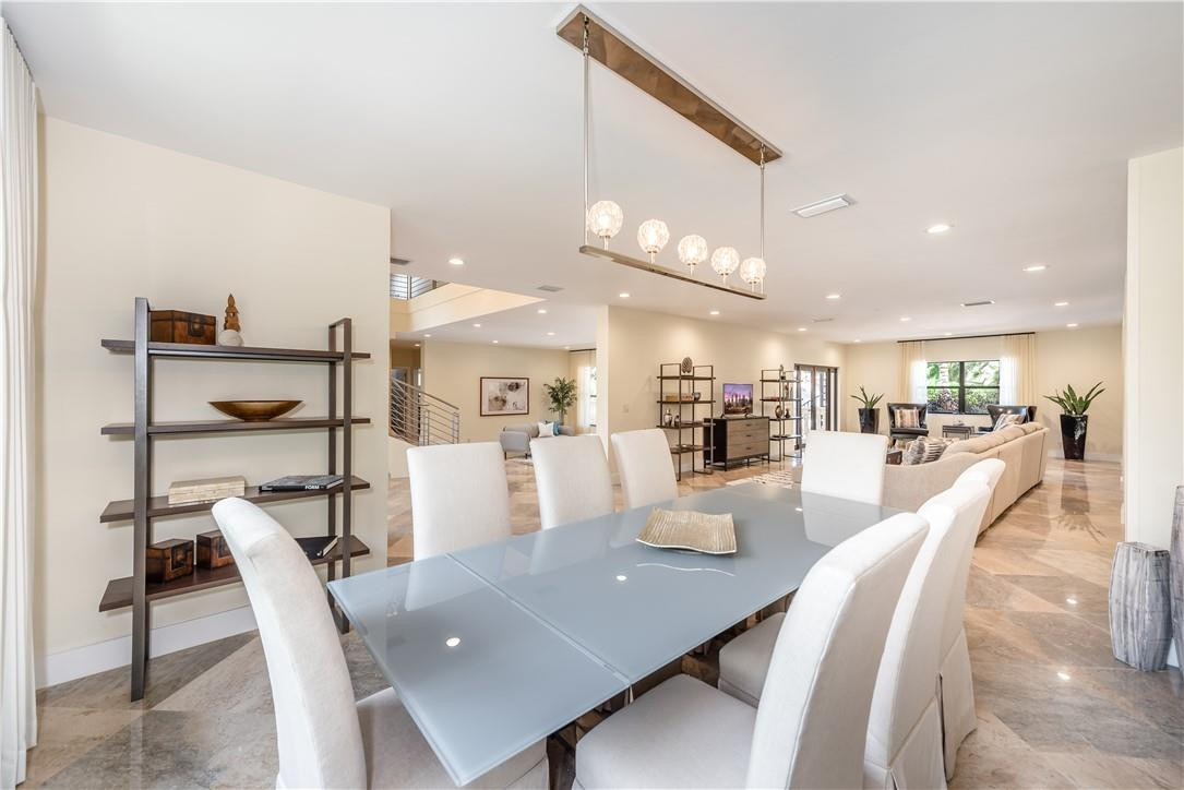 6330 Volunteer Road Southwest Ranches, FL 33330 - Photo 17 of 58 a dining room with furniture and a view of kitchen