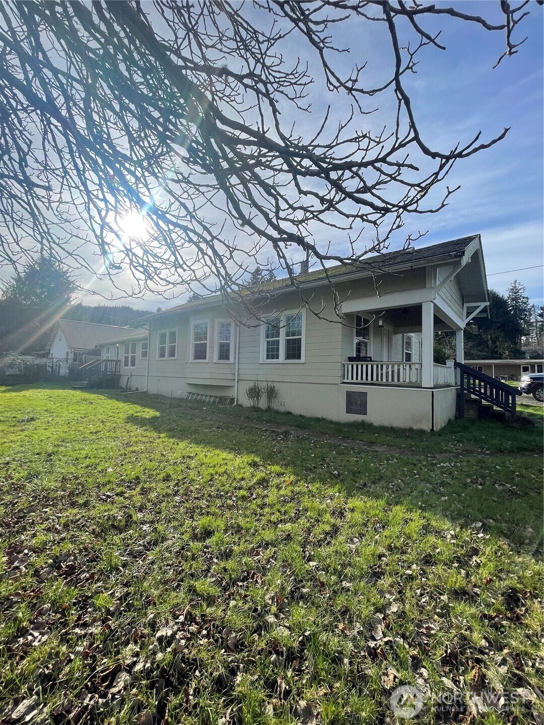 2101 Henkle Street Raymond, WA 98577 - Photo 2 of 18 a view of a house with a yard