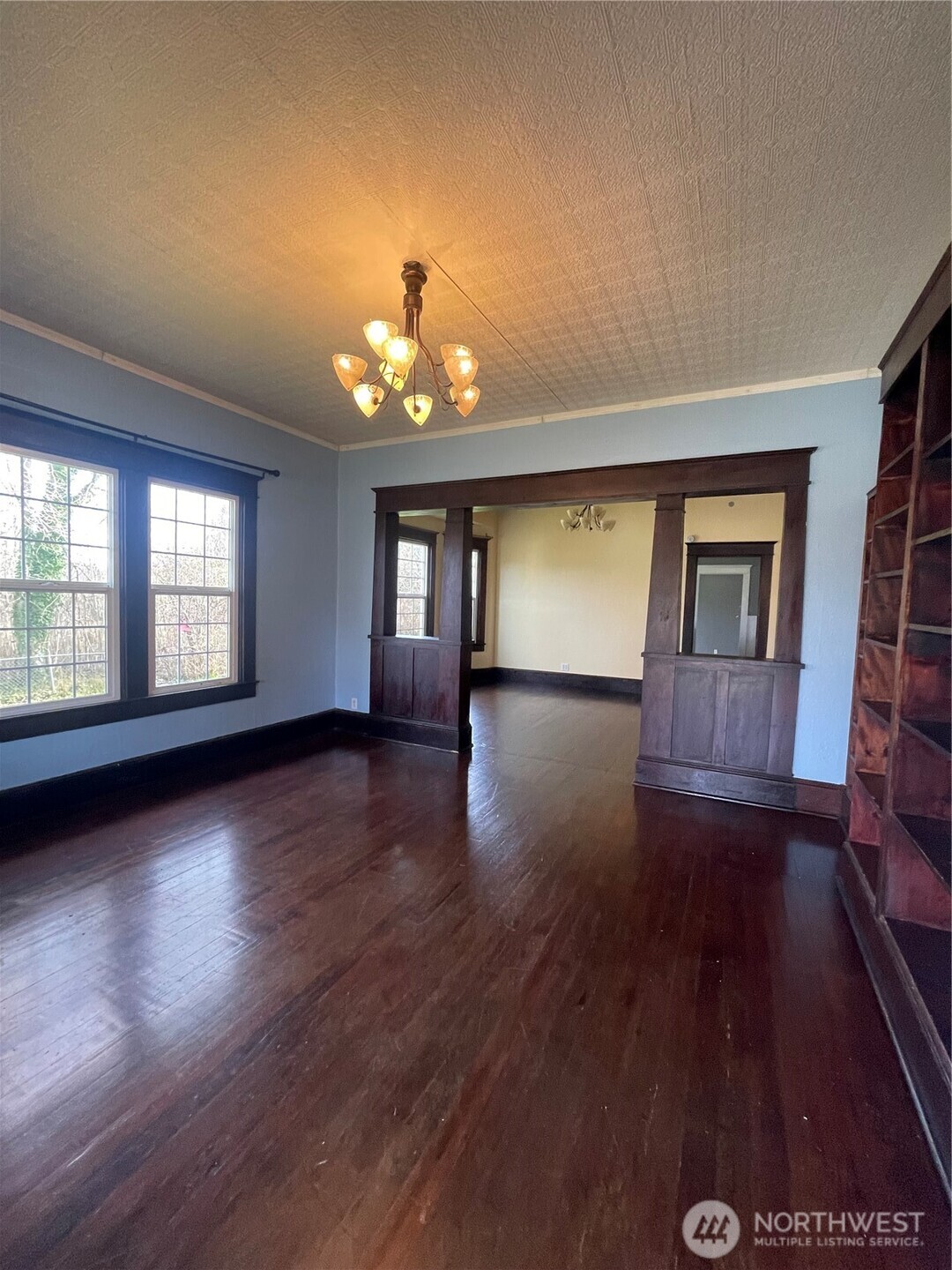 2101 Henkle Street Raymond, WA 98577 - Photo 4 of 18 wooden floor in an empty room with a window