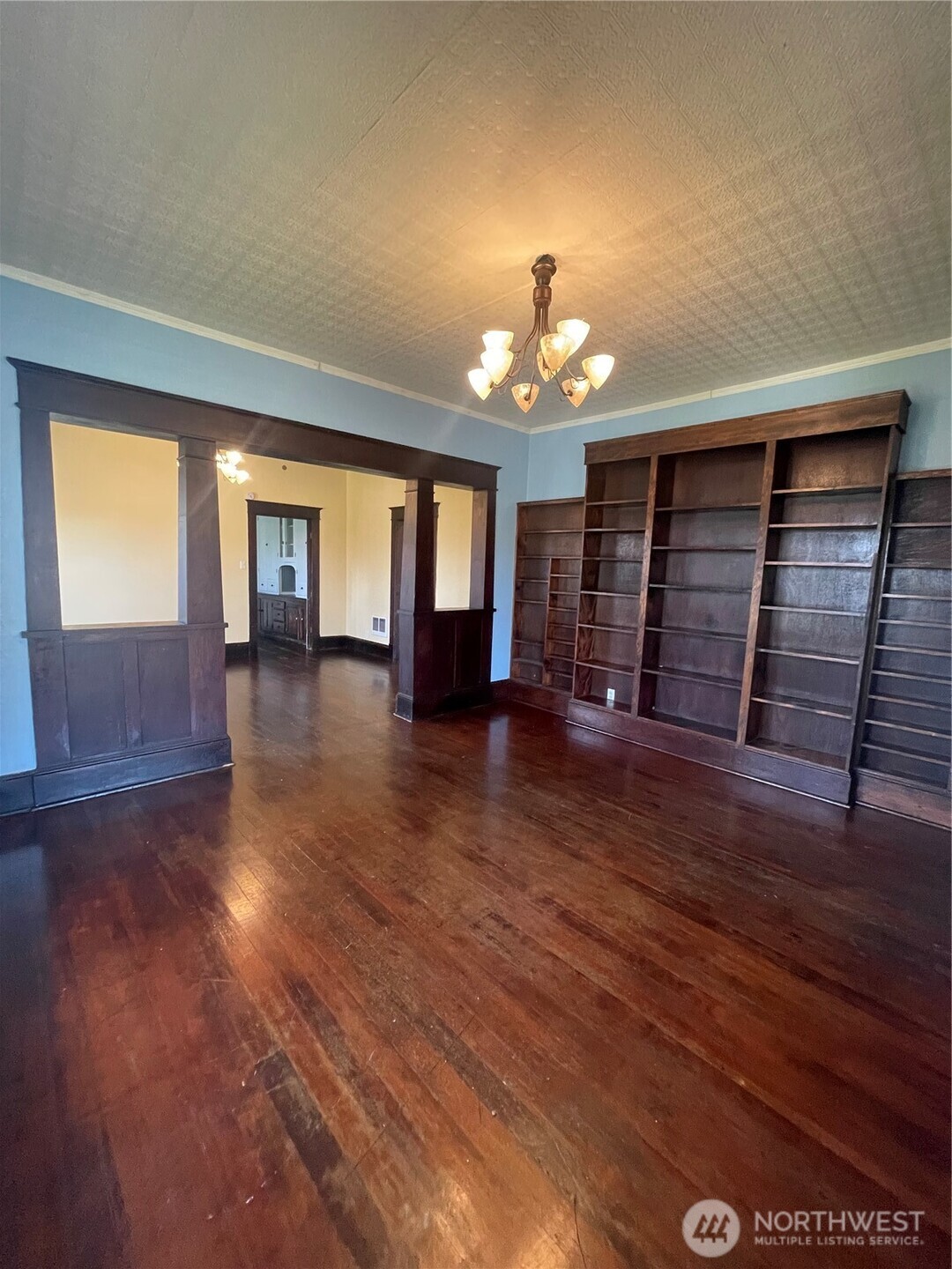 2101 Henkle Street Raymond, WA 98577 - Photo 5 of 18 wooden floor in an empty room with a window