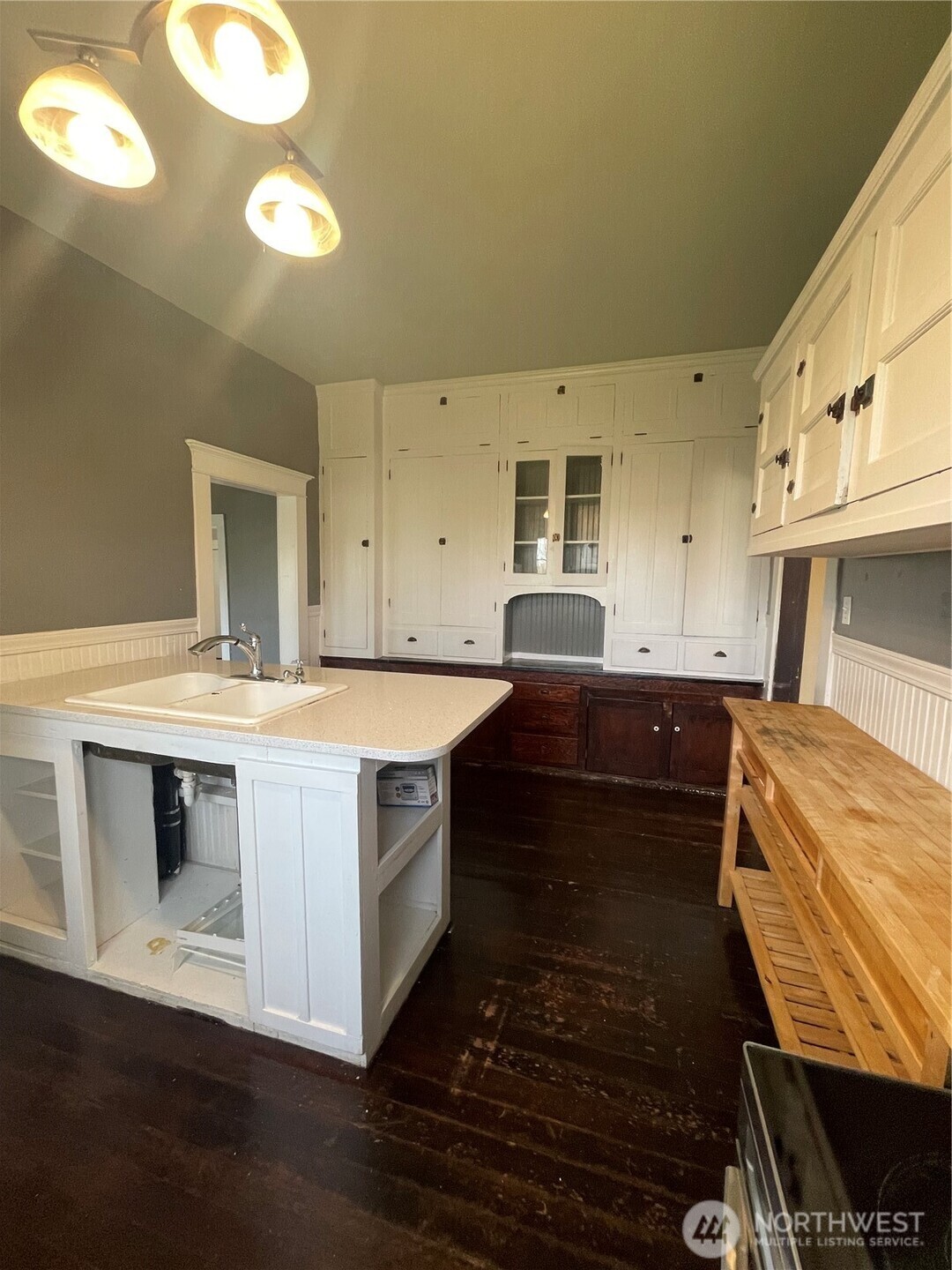 2101 Henkle Street Raymond, WA 98577 - Photo 8 of 18 a kitchen with a stove and a sink