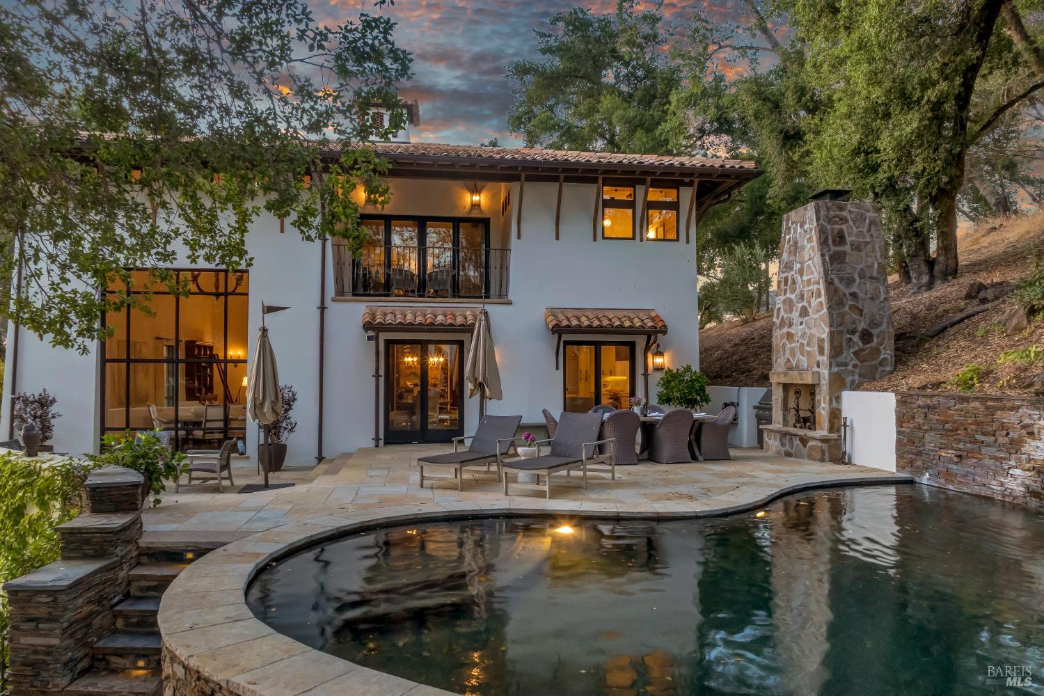 This is a rare opportunity to acquire prime Napa Valley Real Estate. Set on over 4 acres of meticulously landscaped land, this property embodies luxury living. Guests are welcomed by front gates for privacy a grand driveway, setting stage for an impressive arrival. This offer includes and small cabernet vineyard, two wine cellars, a finished garage, heated saltwater pool, panoramic views and a separate guest house with a full kitchen and living room2 bedrooms and 2 full baths. Ideal as a private sanctuary or prestigious investment, this property promises ifestyle of unparalleled luxury and distinction.