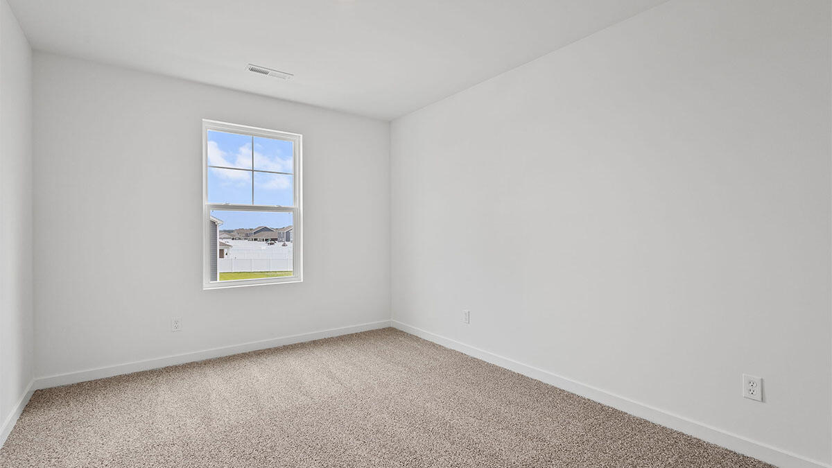 444 Fry Street Hebron, IN 46341 - Photo 16 of 25 a view of an empty room with a window