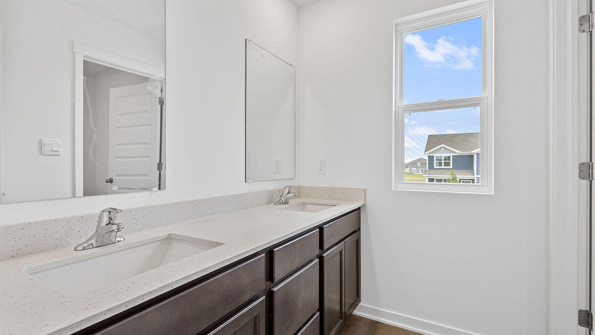 444 Fry Street Hebron, IN 46341 - Photo 24 of 25 a bathroom with a sink and a mirror