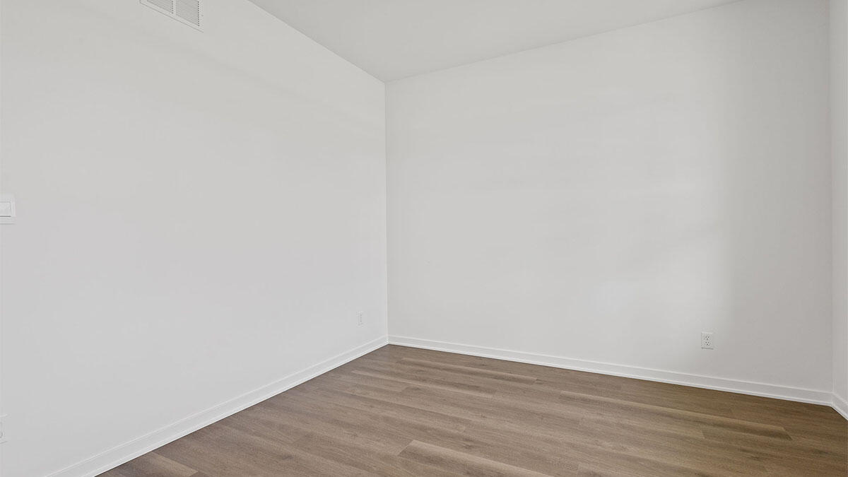 444 Fry Street Hebron, IN 46341 - Photo 8 of 25 a view of an empty room with wooden floor