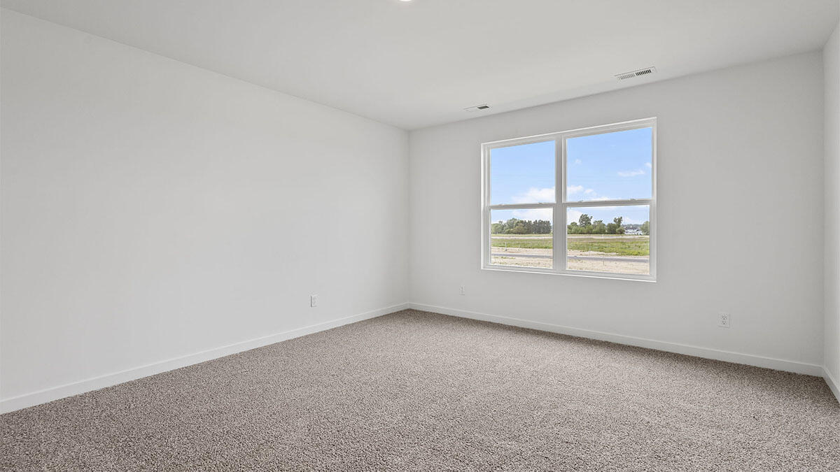 444 Fry Street Hebron, IN 46341 - Photo 10 of 25 an empty room with a window