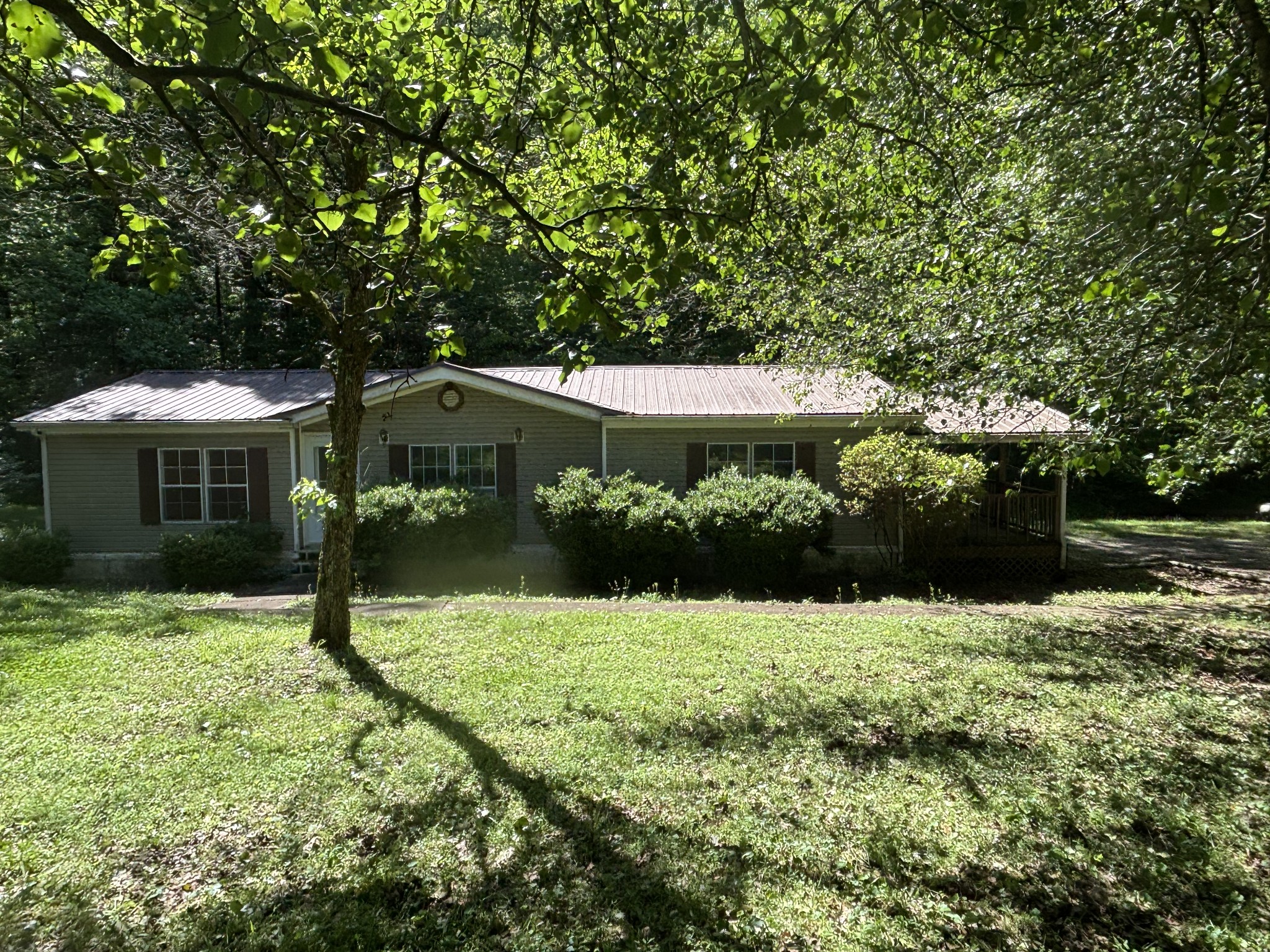 3329 Tackets Branch Road Prospect, TN 38477 - Photo 1 of 24 a front view of a house with a yard