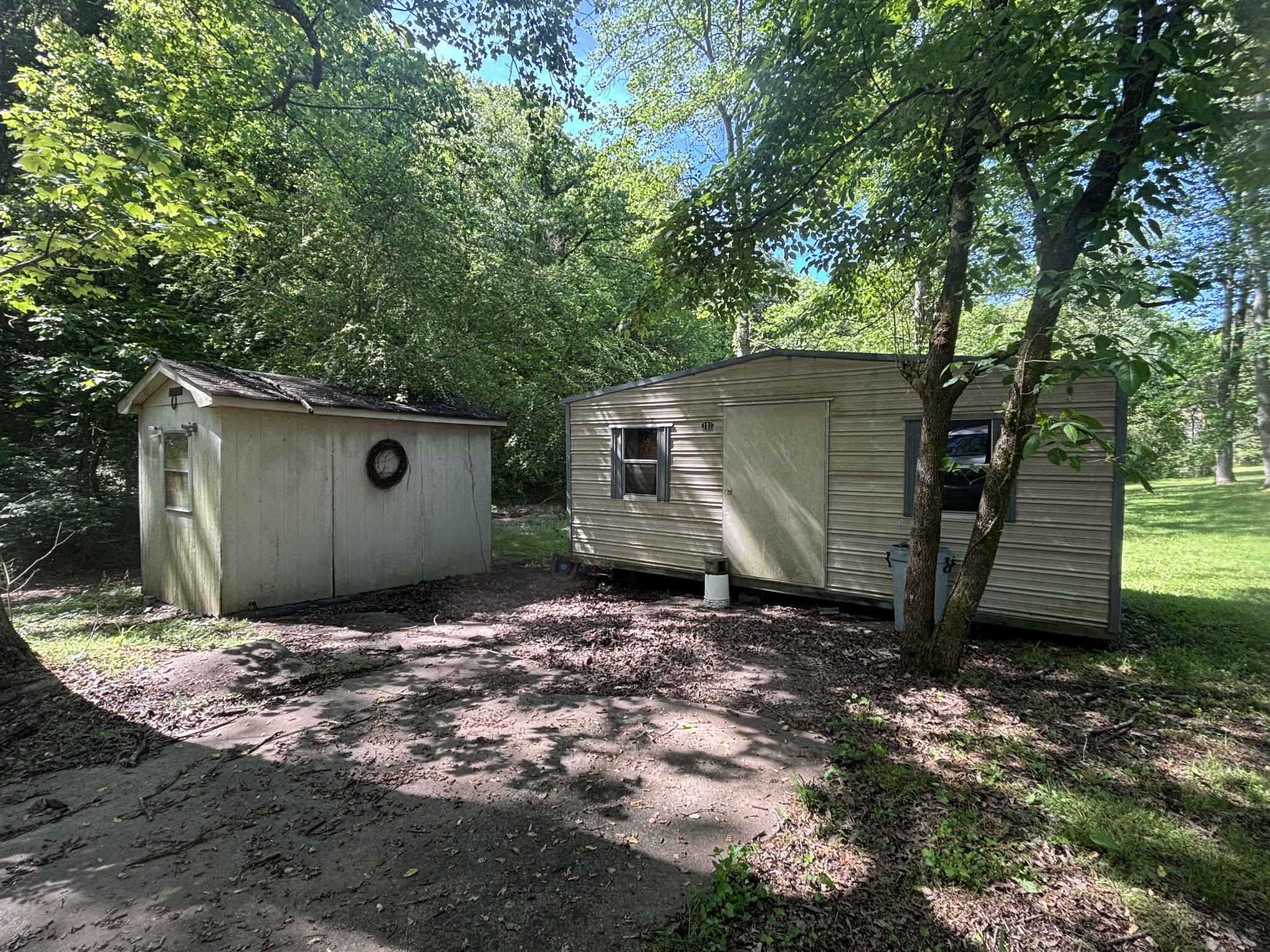 3329 Tackets Branch Road Prospect, TN 38477 - Photo 11 of 24 a backyard of a house with lots of green space