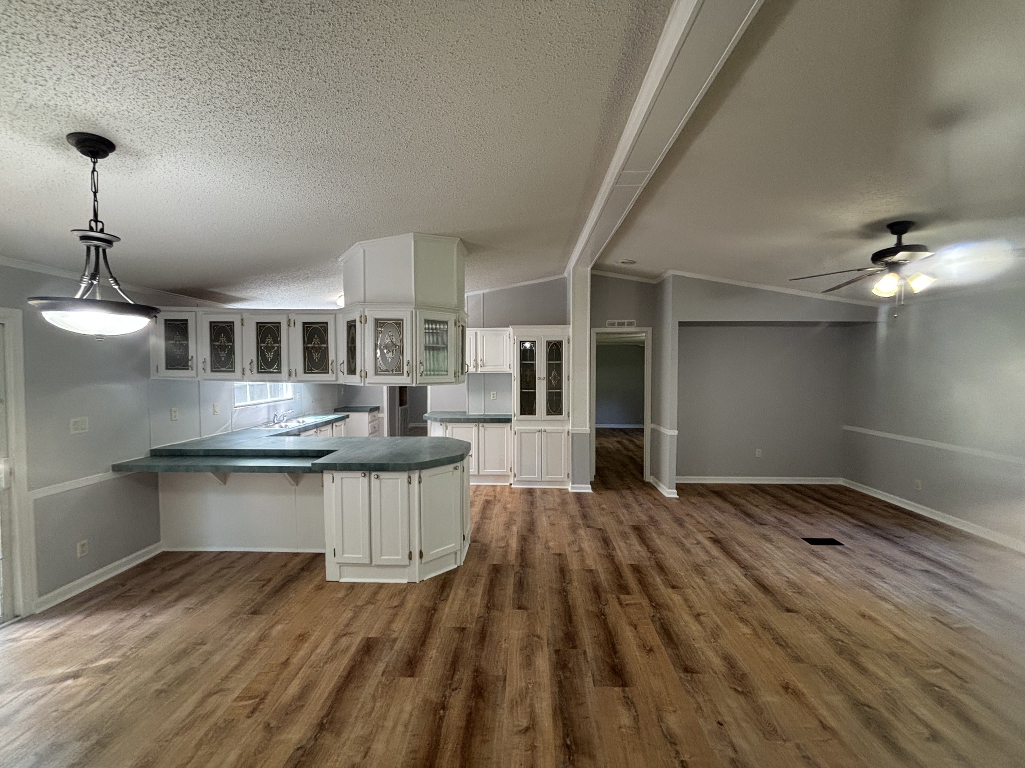 3329 Tackets Branch Road Prospect, TN 38477 - Photo 13 of 24 a kitchen with a sink and wooden floor