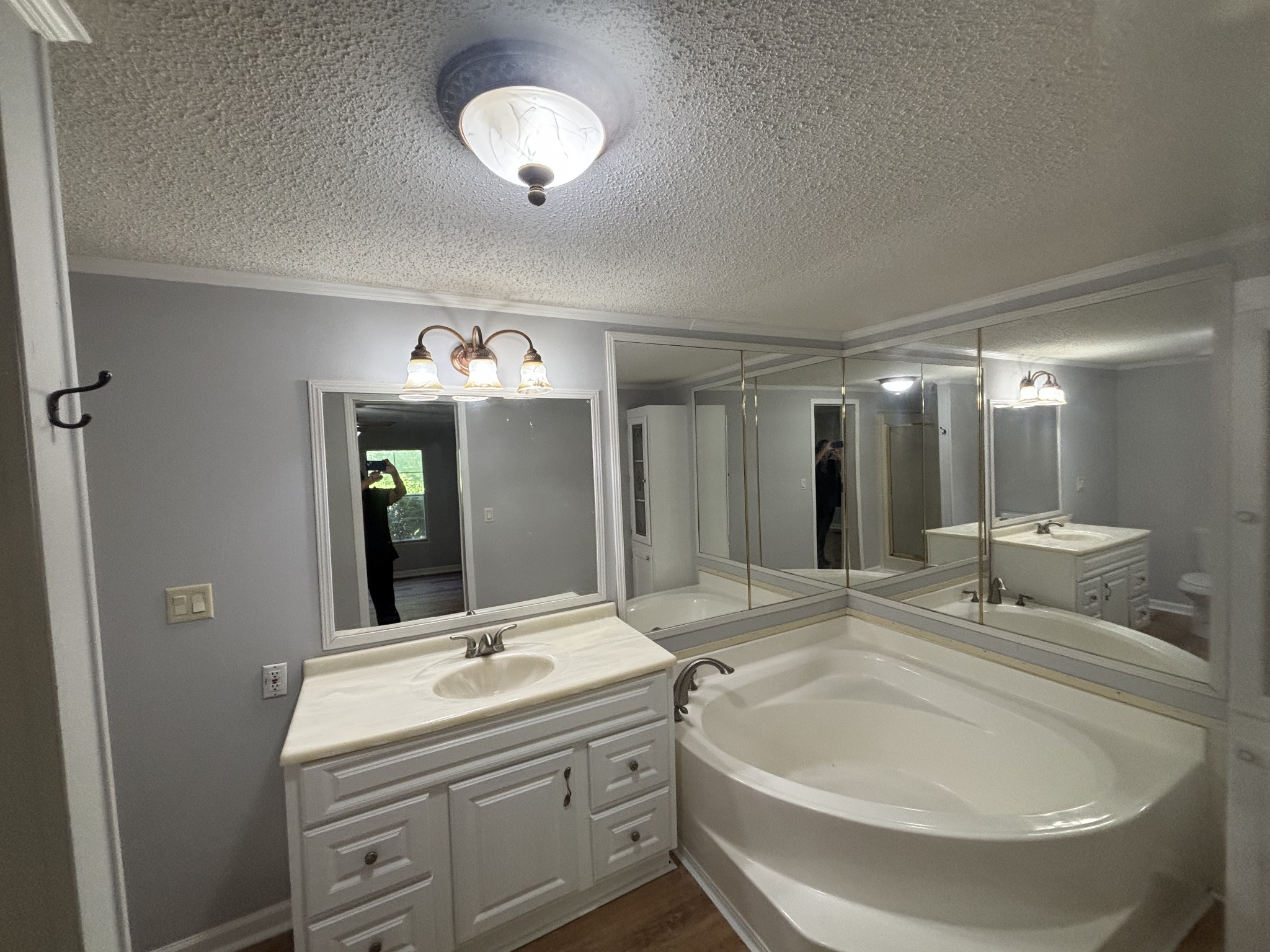 3329 Tackets Branch Road Prospect, TN 38477 - Photo 17 of 24 a bathroom with a double vanity sink and a mirror
