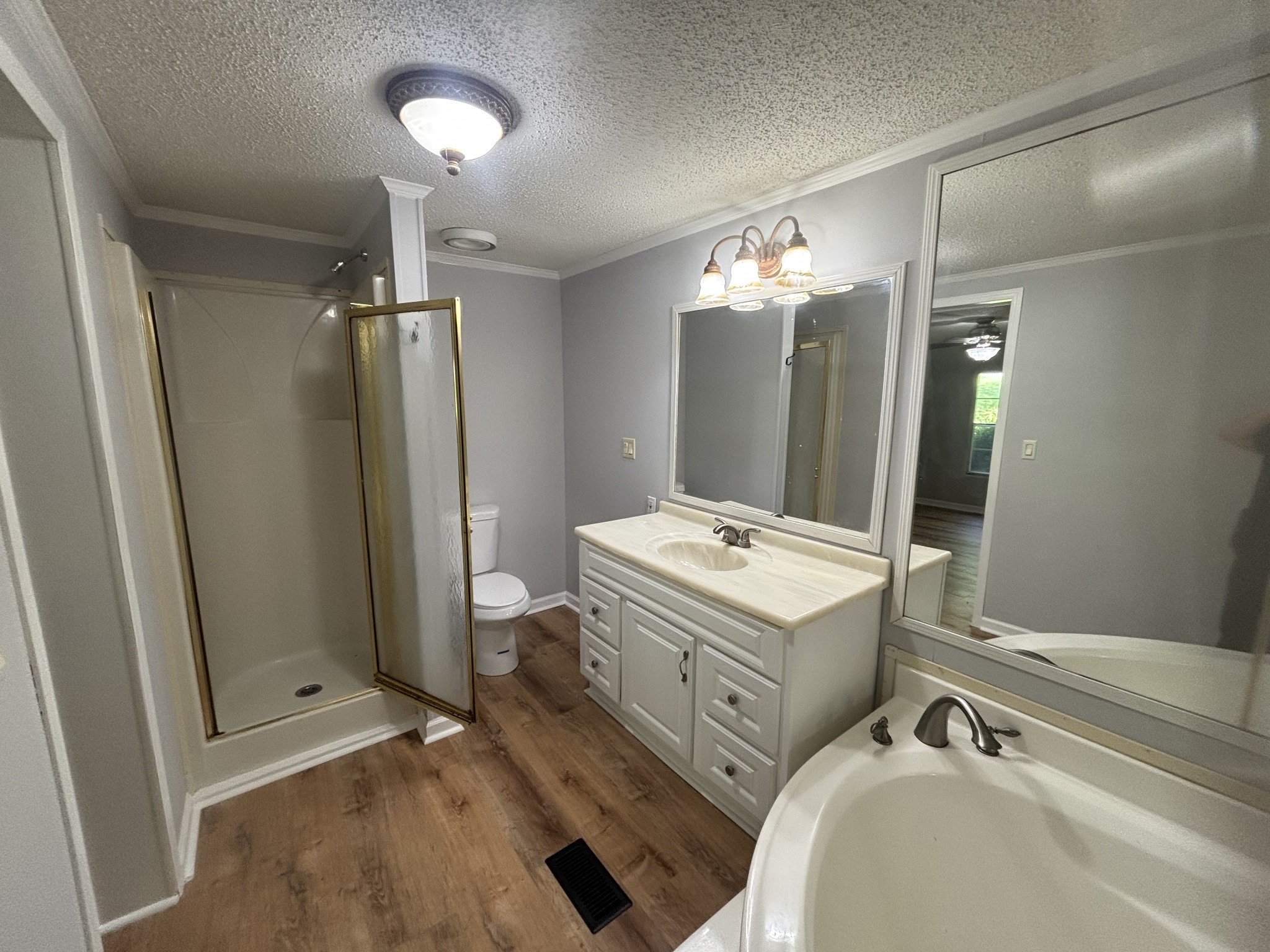3329 Tackets Branch Road Prospect, TN 38477 - Photo 18 of 24 a bathroom with a sink vanity and mirror