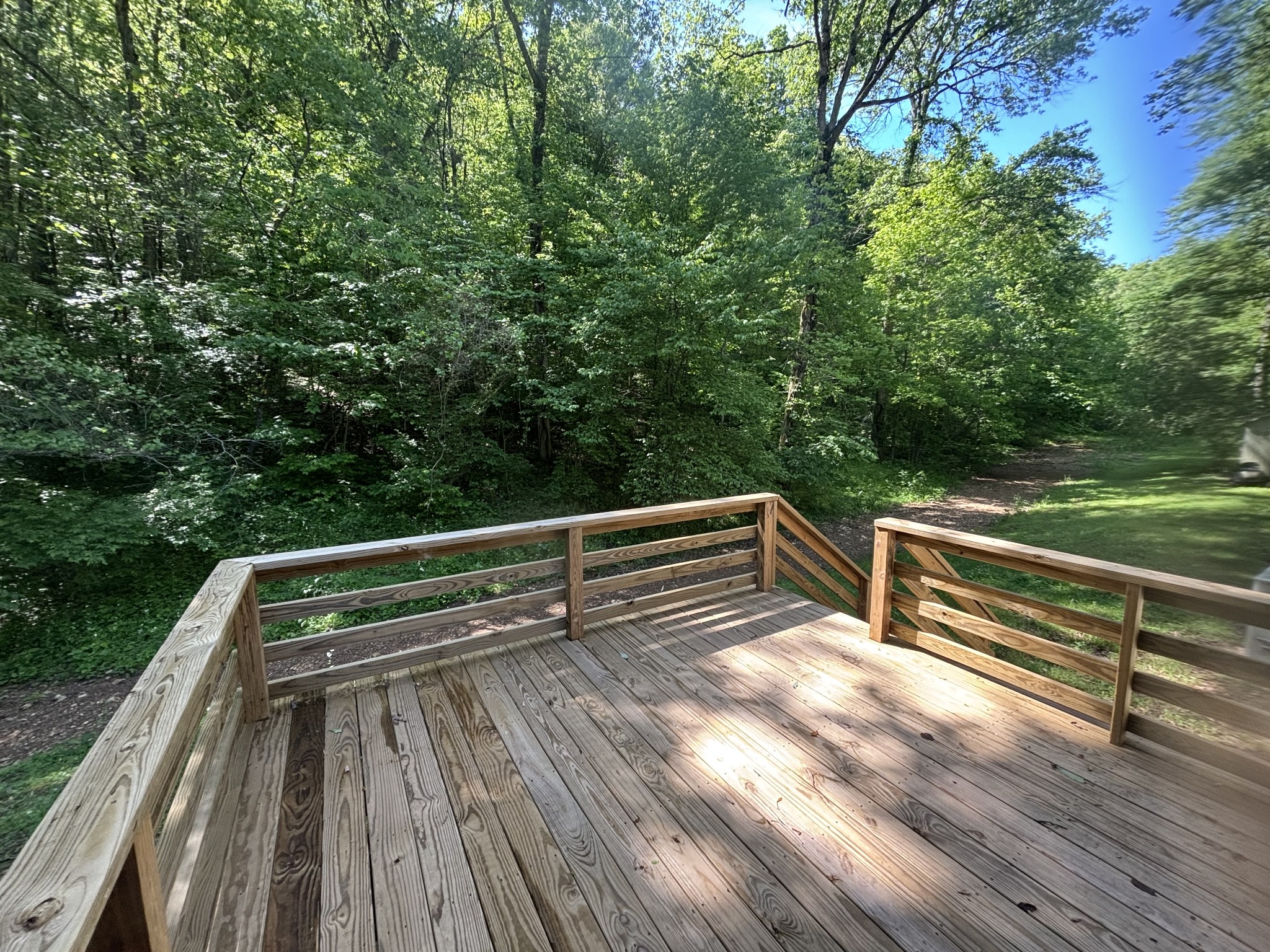 3329 Tackets Branch Road Prospect, TN 38477 - Photo 22 of 24 a view of deck with wooden floor and outdoor seating