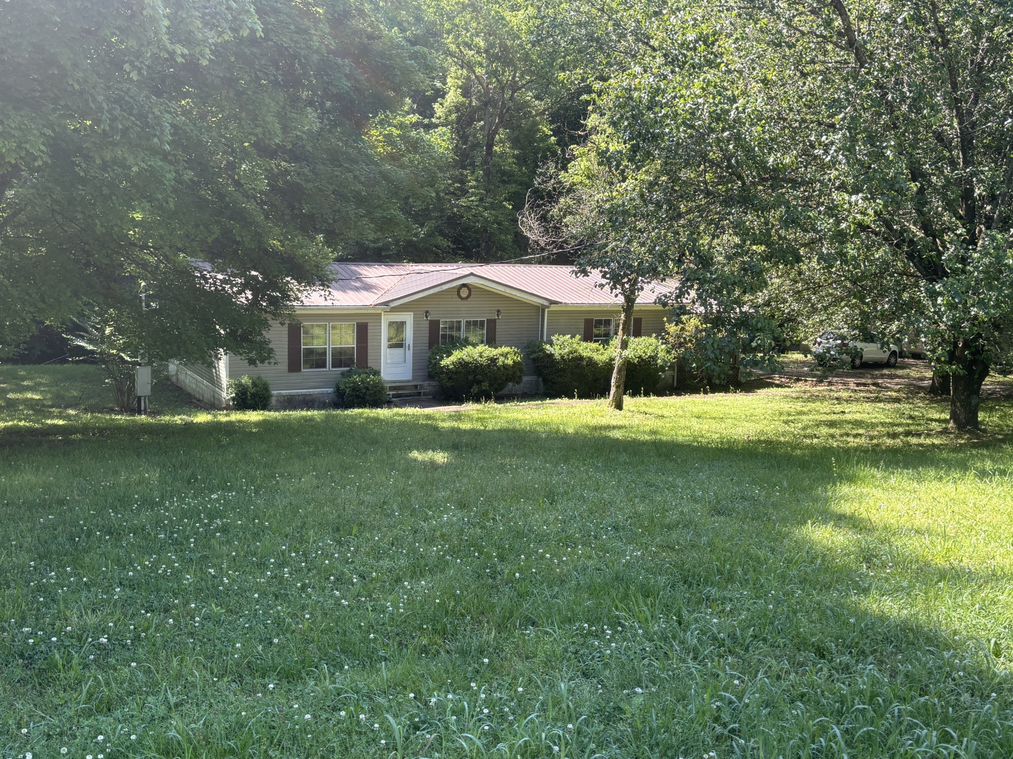 3329 Tackets Branch Road Prospect, TN 38477 - Photo 3 of 24 a view of a house with a big yard