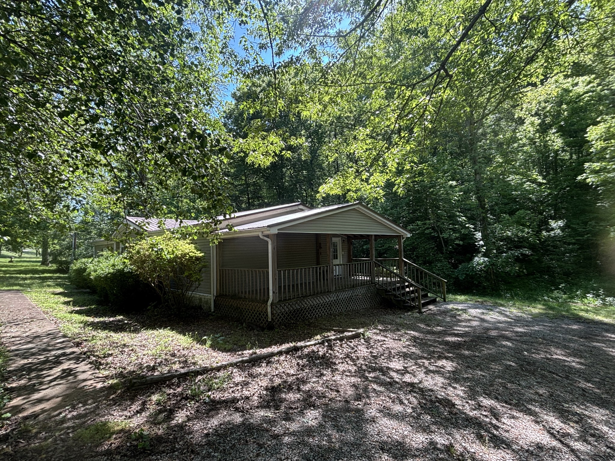 3329 Tackets Branch Road Prospect, TN 38477 - Photo 4 of 24 a view of backyard with a barn and a large trees