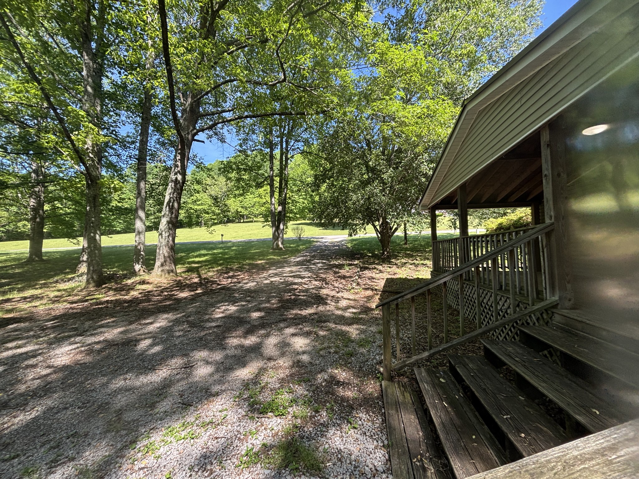 3329 Tackets Branch Road Prospect, TN 38477 - Photo 5 of 24 a backyard of a house with lots of green space
