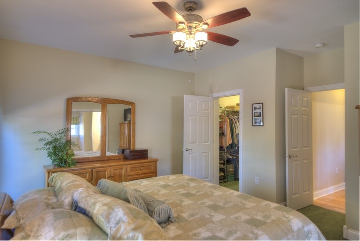 53 Old White Bridge Road Waynesboro, VA 22980 - Photo 23 of 49 a bedroom with a bed and a chandelier